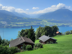 Swiss mountain landscape with a lake View of a lake surrounded by mountains