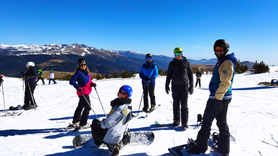 Team Event Skiing Group of people in the snow wearing ski gear