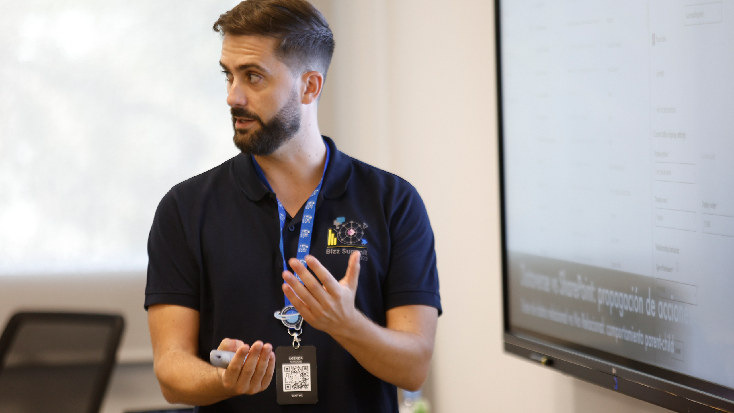 Man speaking during a presentation