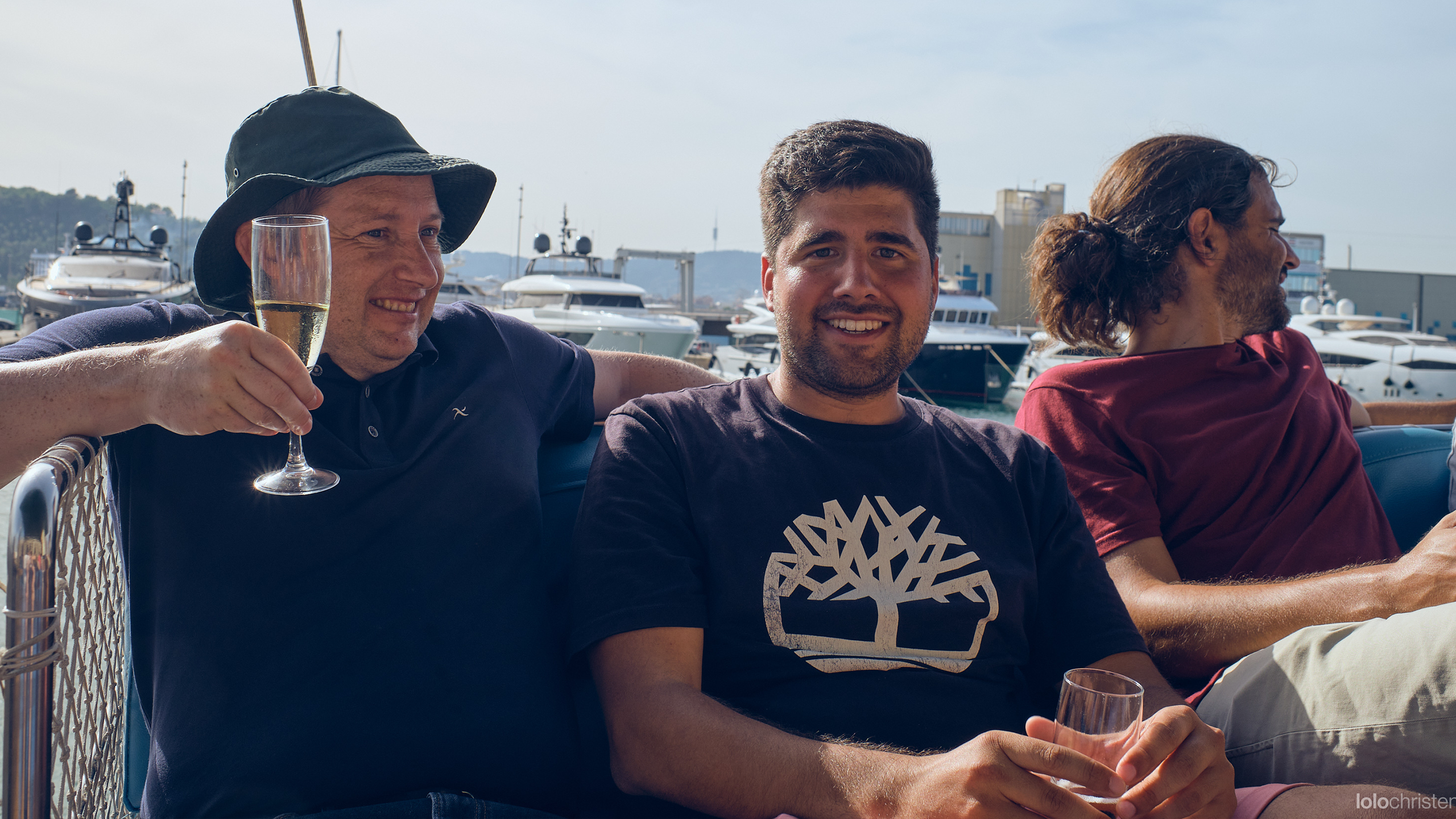 Three men sitting next to each other