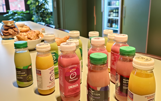 Office Life - zäme rede breakfast Breakfast table with bottles of smoothies in different colours