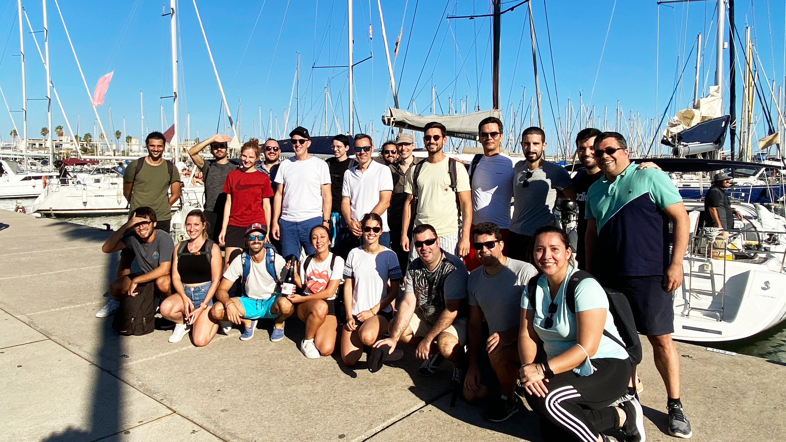 isolutions barcelona group photo at the harbour