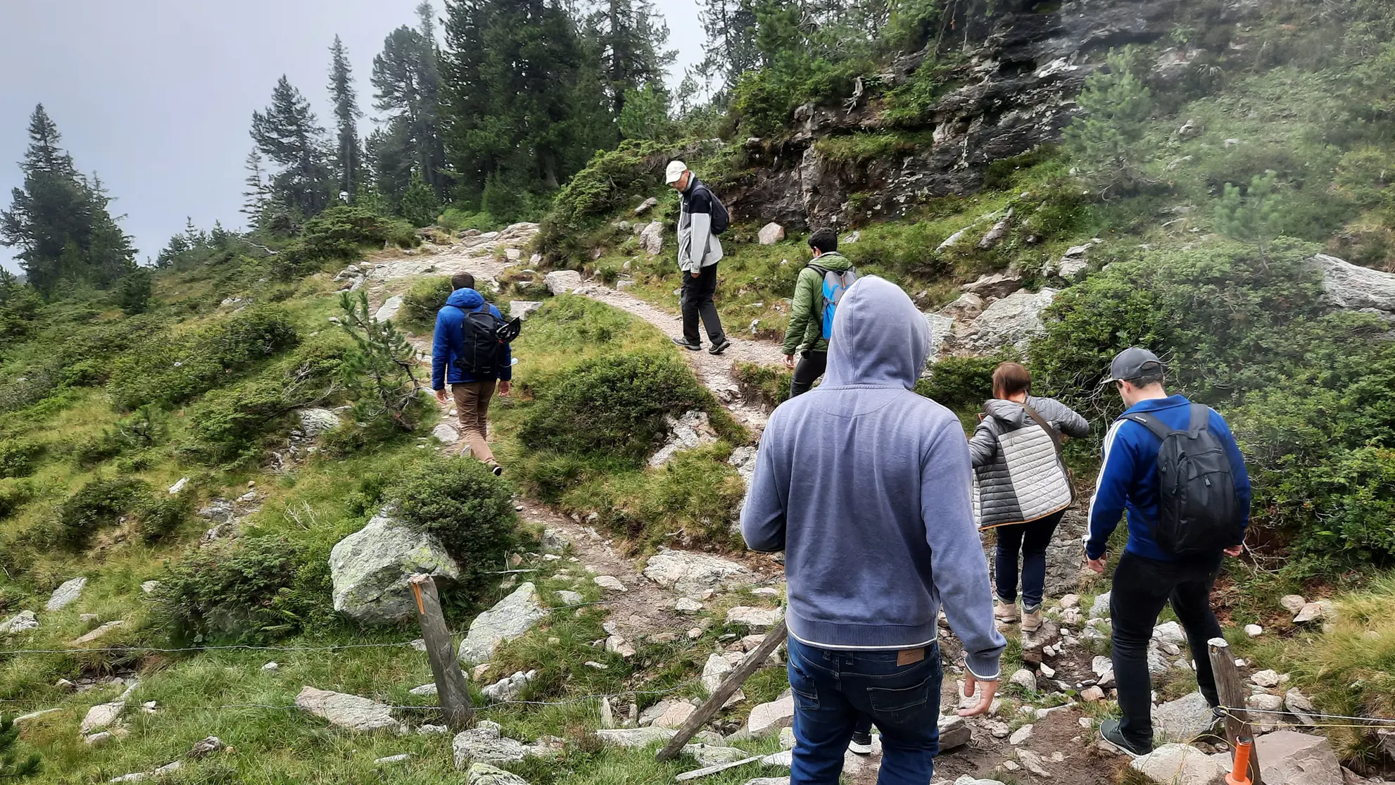 People on a hike in the Swiss mountains