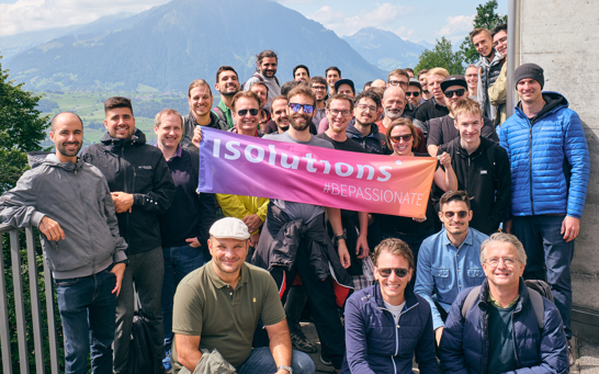 Business Solutions Team Team picture with the mountains in the background