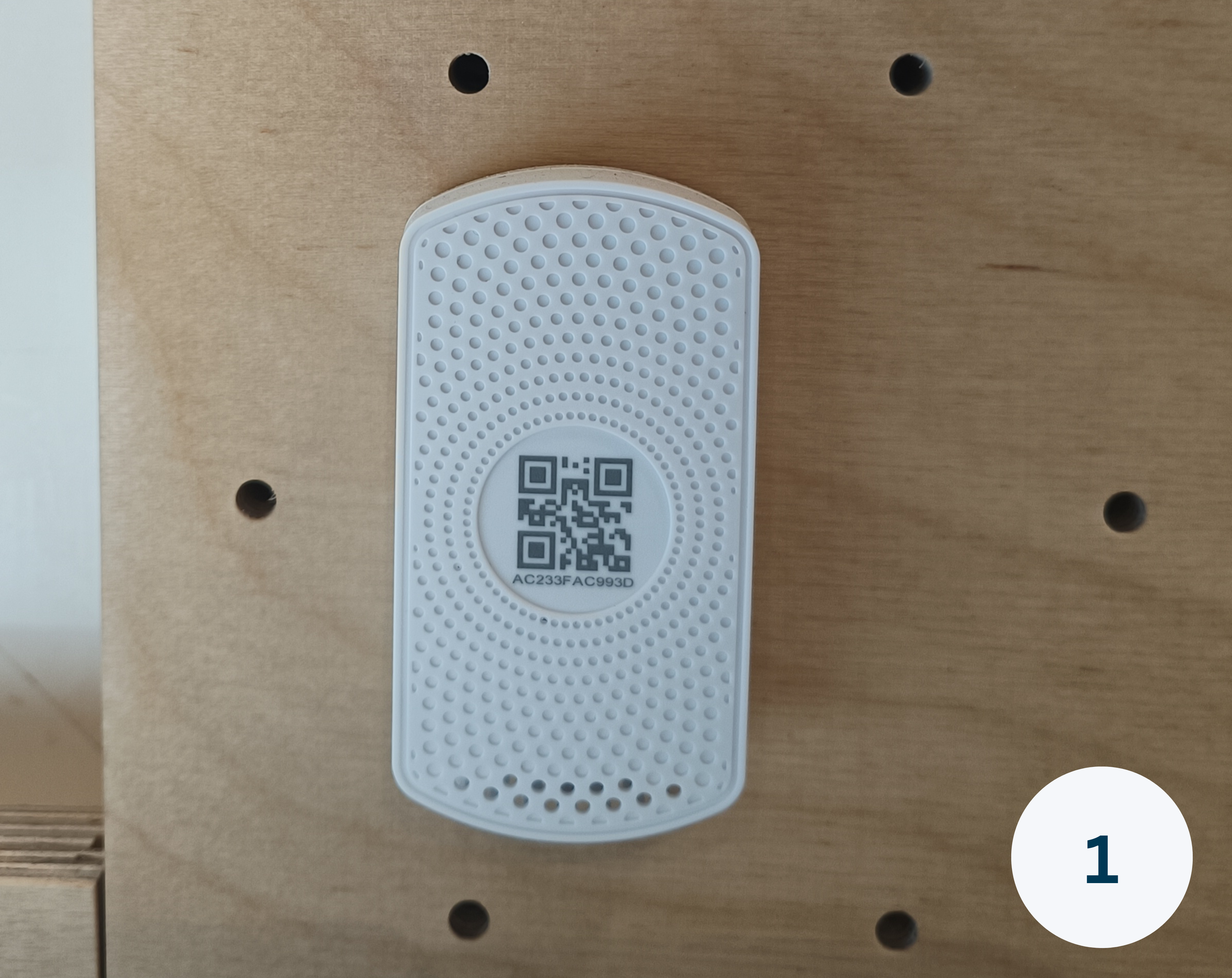 Close-up of a Minew S1 sensors to show the functionality of a smart office