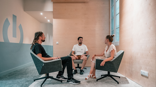 Team meeting in the modern isolutions office in Barcelona